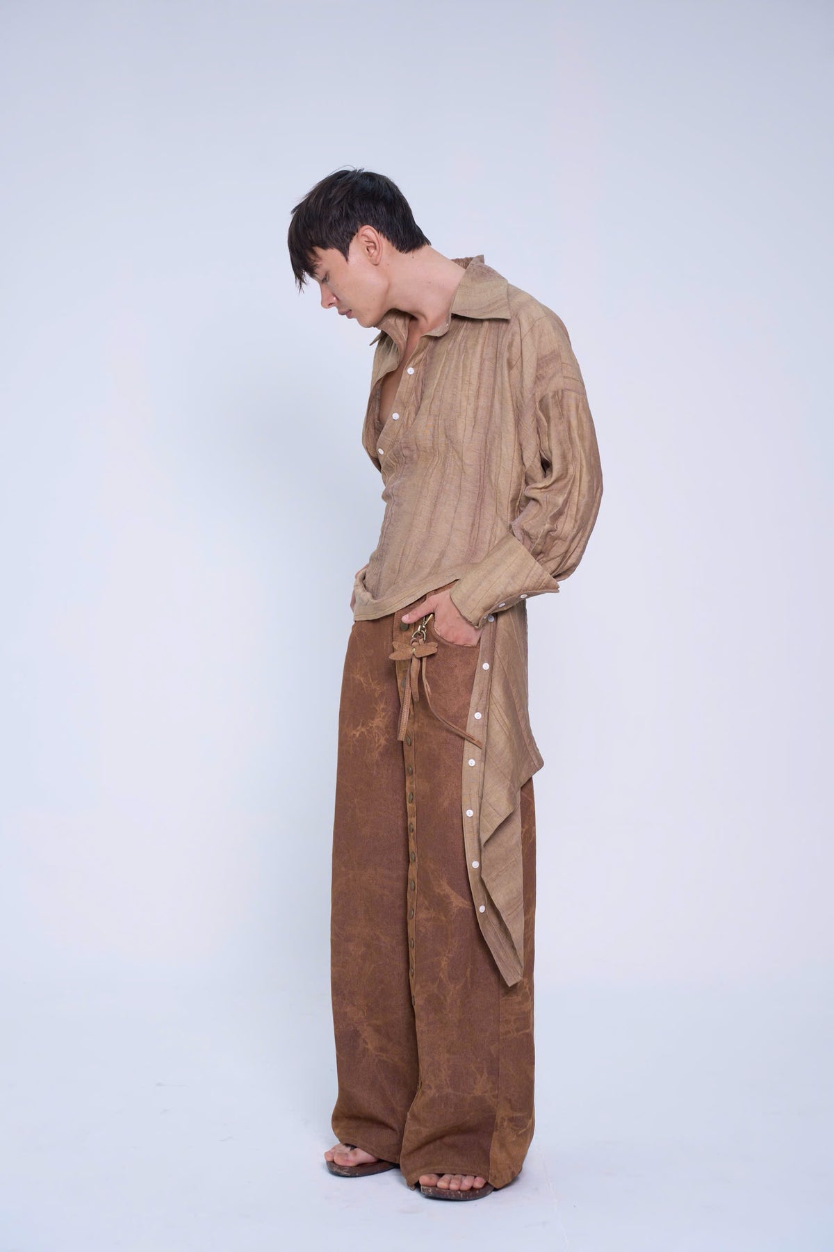 BROWN STRAY JEANS