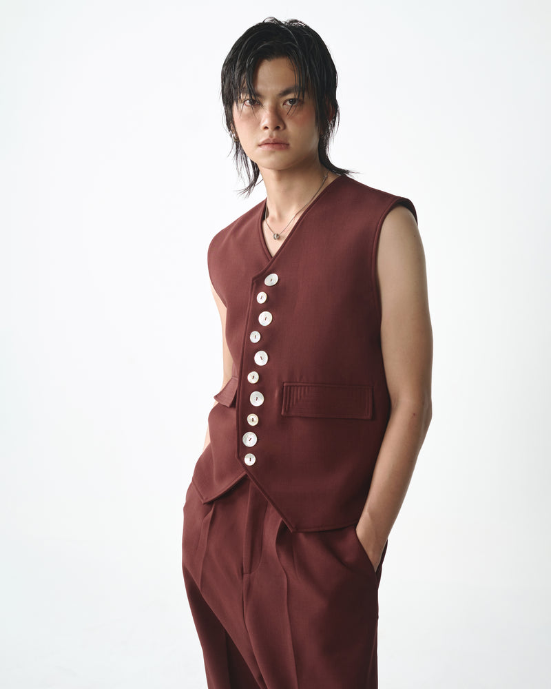 BROWN CURVED LEG PANTS