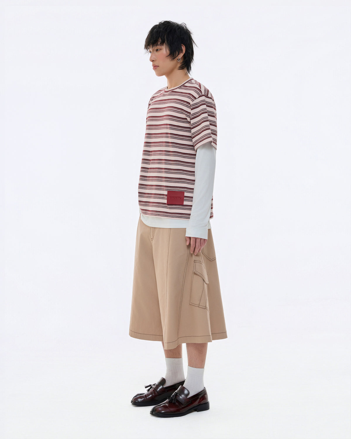 DIAGONAL SIDE CROPPED TROUSERS