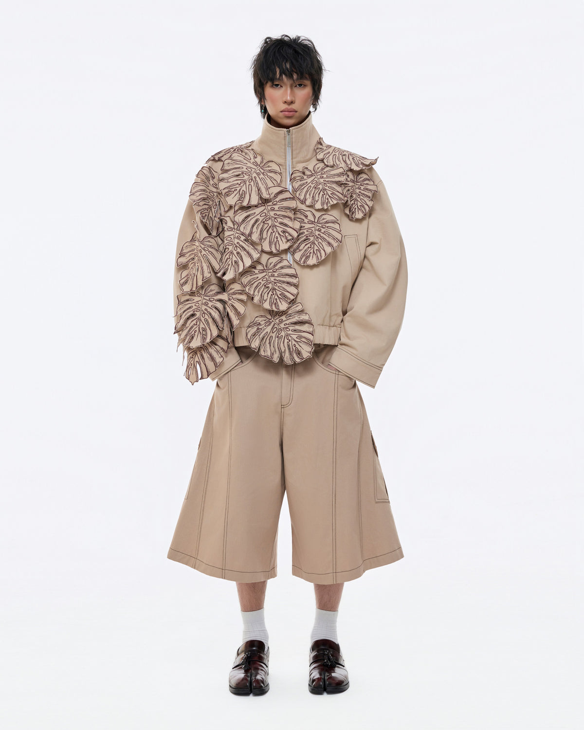 DIAGONAL SIDE CROPPED TROUSERS