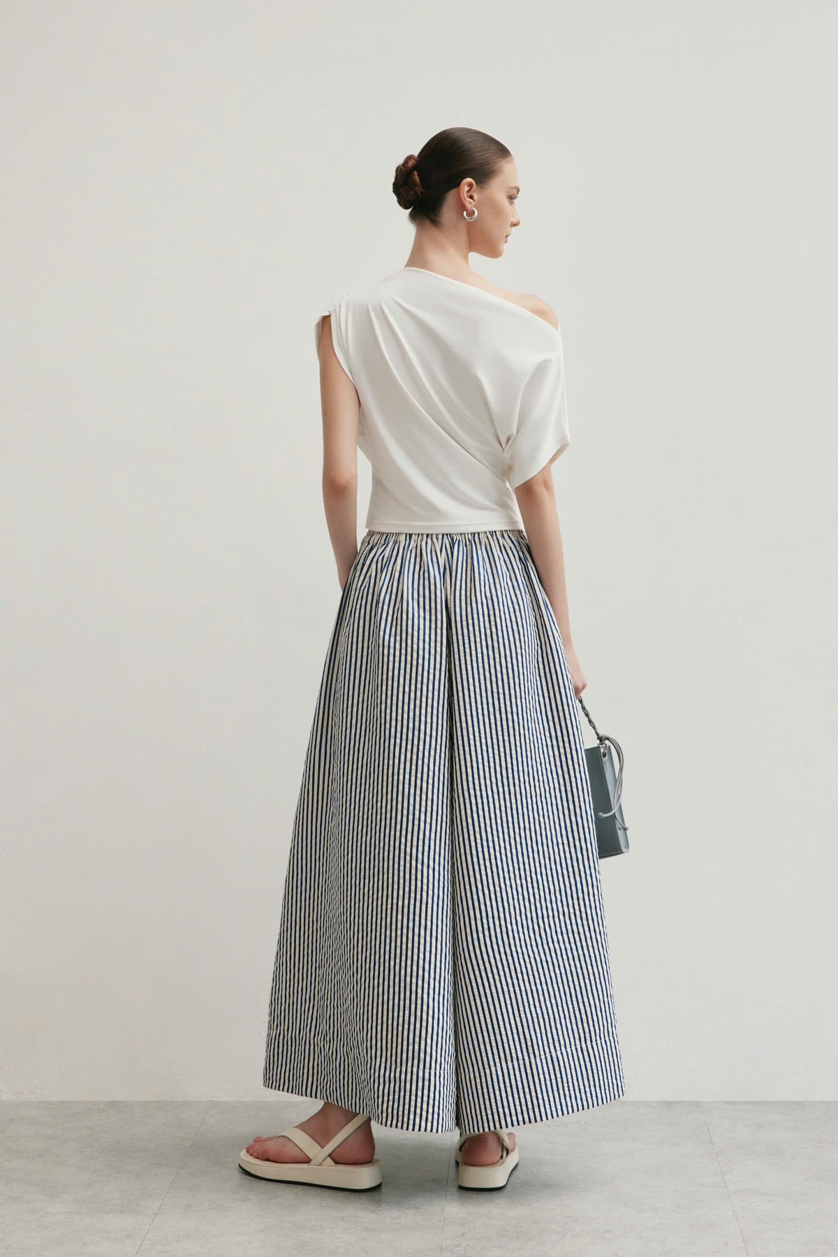 STRIPED FLARED PANTS