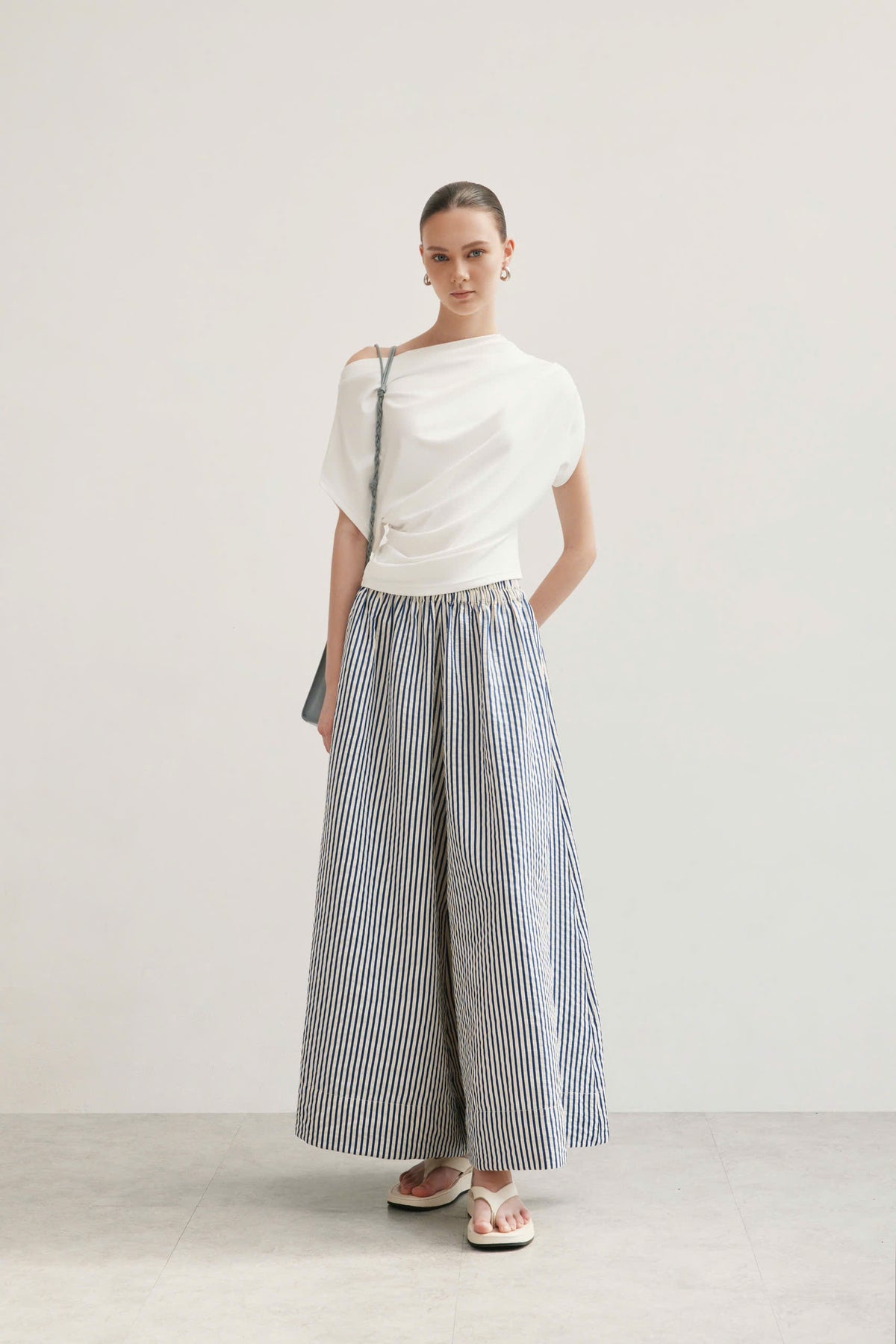STRIPED FLARED PANTS
