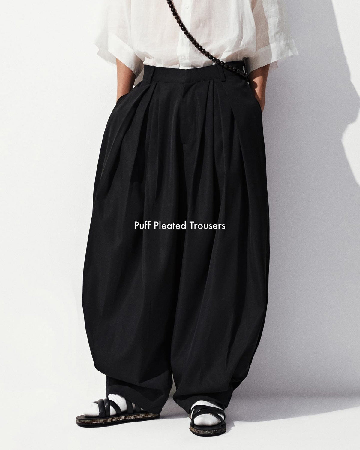 PUFF PLEATED TROUSERS