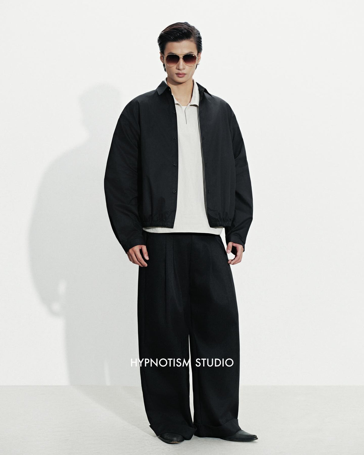 BLACK CRUDE TROUSERS