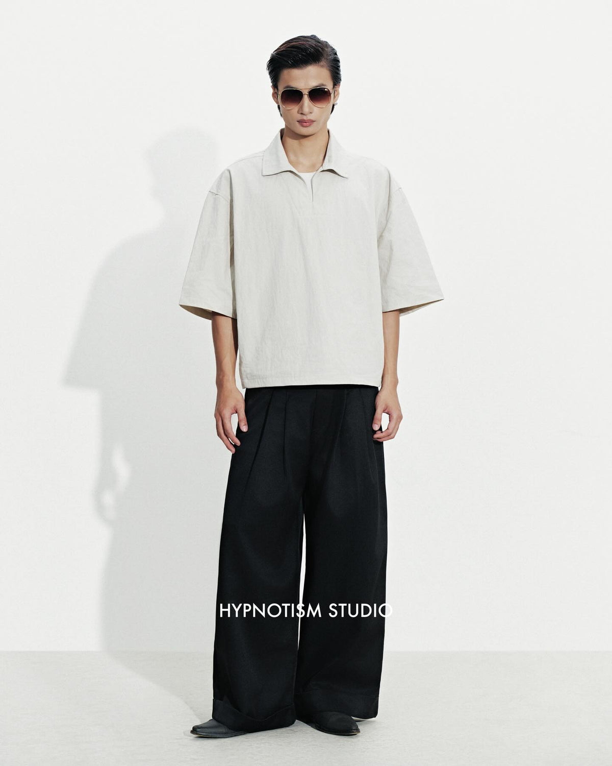 BLACK CRUDE TROUSERS