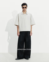BLACK CRUDE TROUSERS