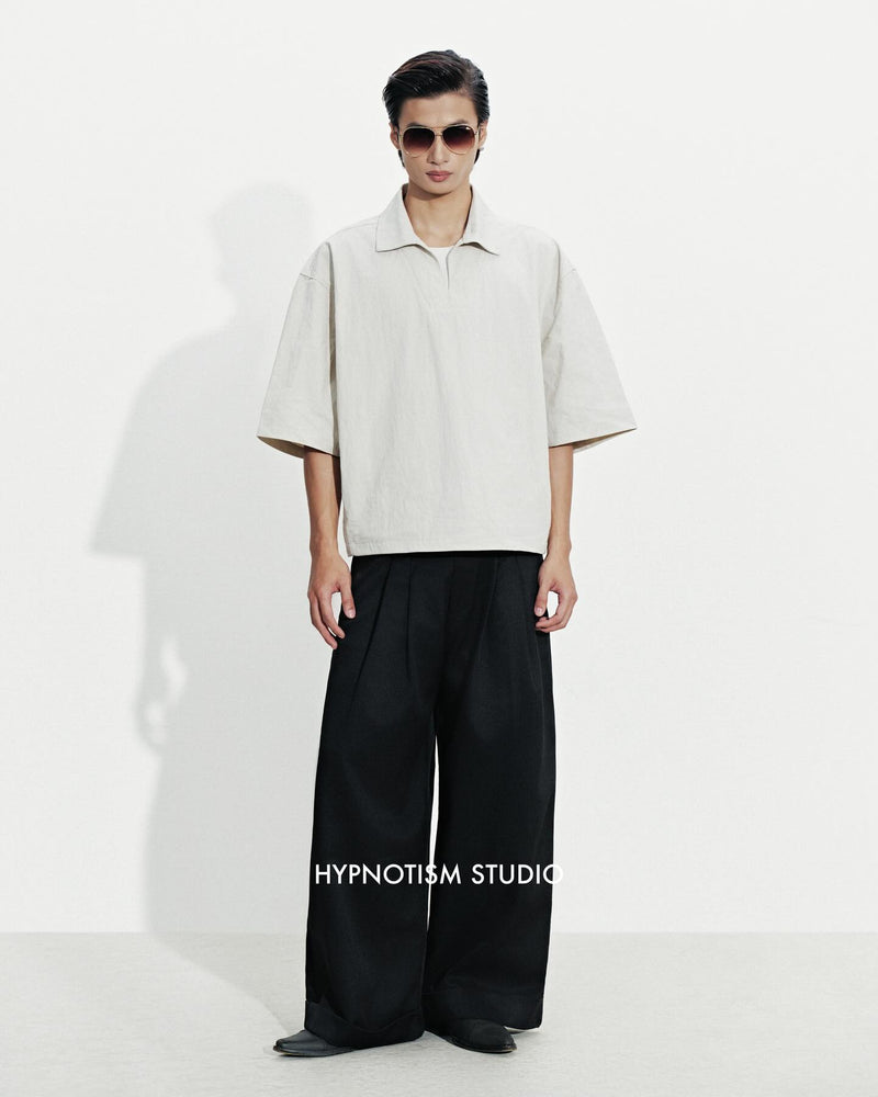 BLACK CRUDE TROUSERS