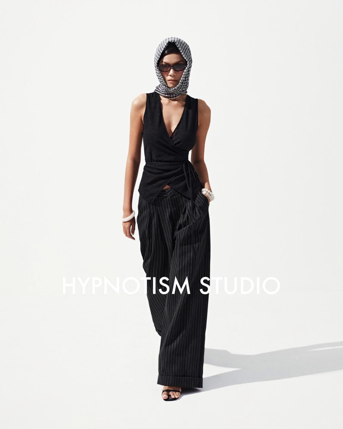 BLACK STRIPED CRUDE TROUSERS