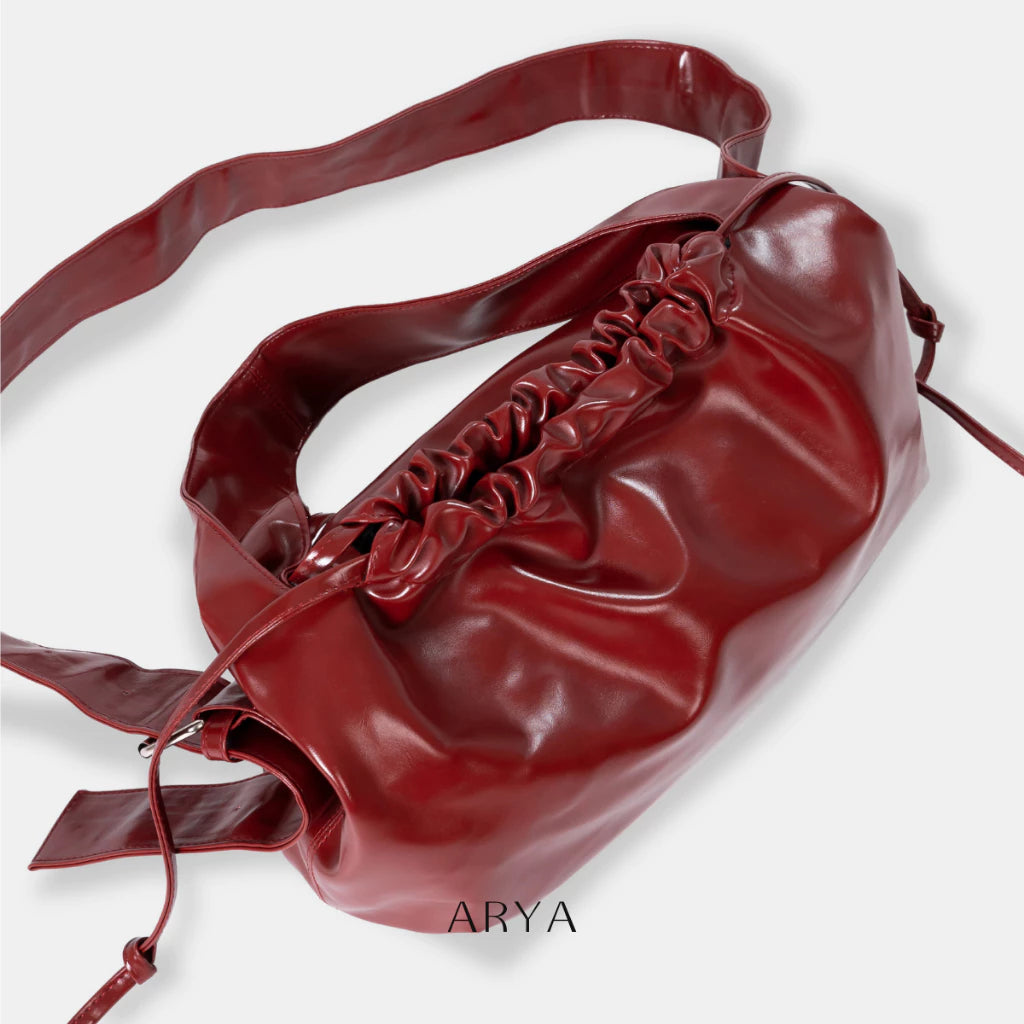 RED DRAWSTRING CROSSBODY