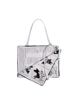 STAINED LEATHER NEWSPAPER BAG