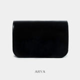 BLACK DAILY FLAP BAG by ARYA in synthetic microfiber leather, dimensions 8.66 x 5.51 x 3.15 inches, available at ASTOUD.
