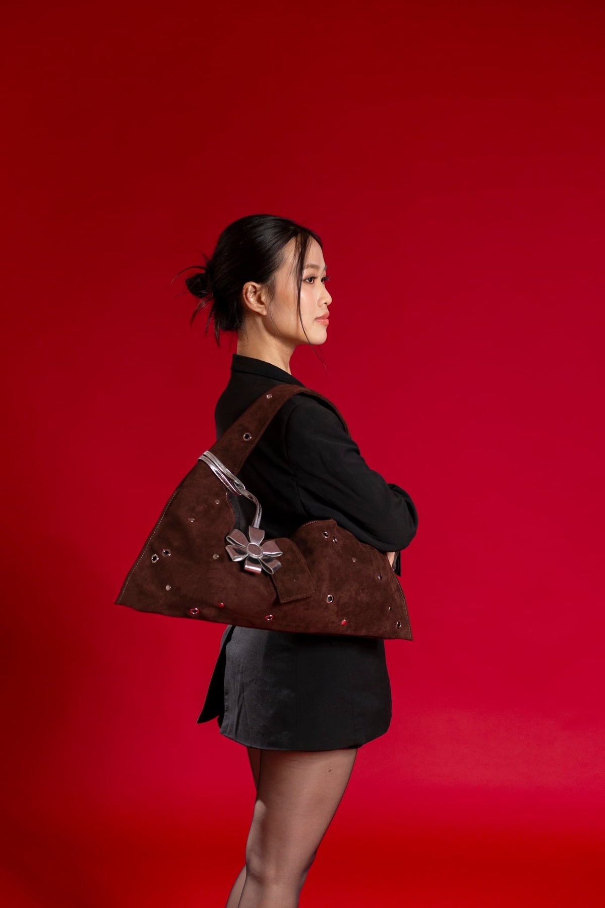 BROWN EYELET CRESCENT BAG