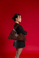 BROWN EYELET CRESCENT BAG